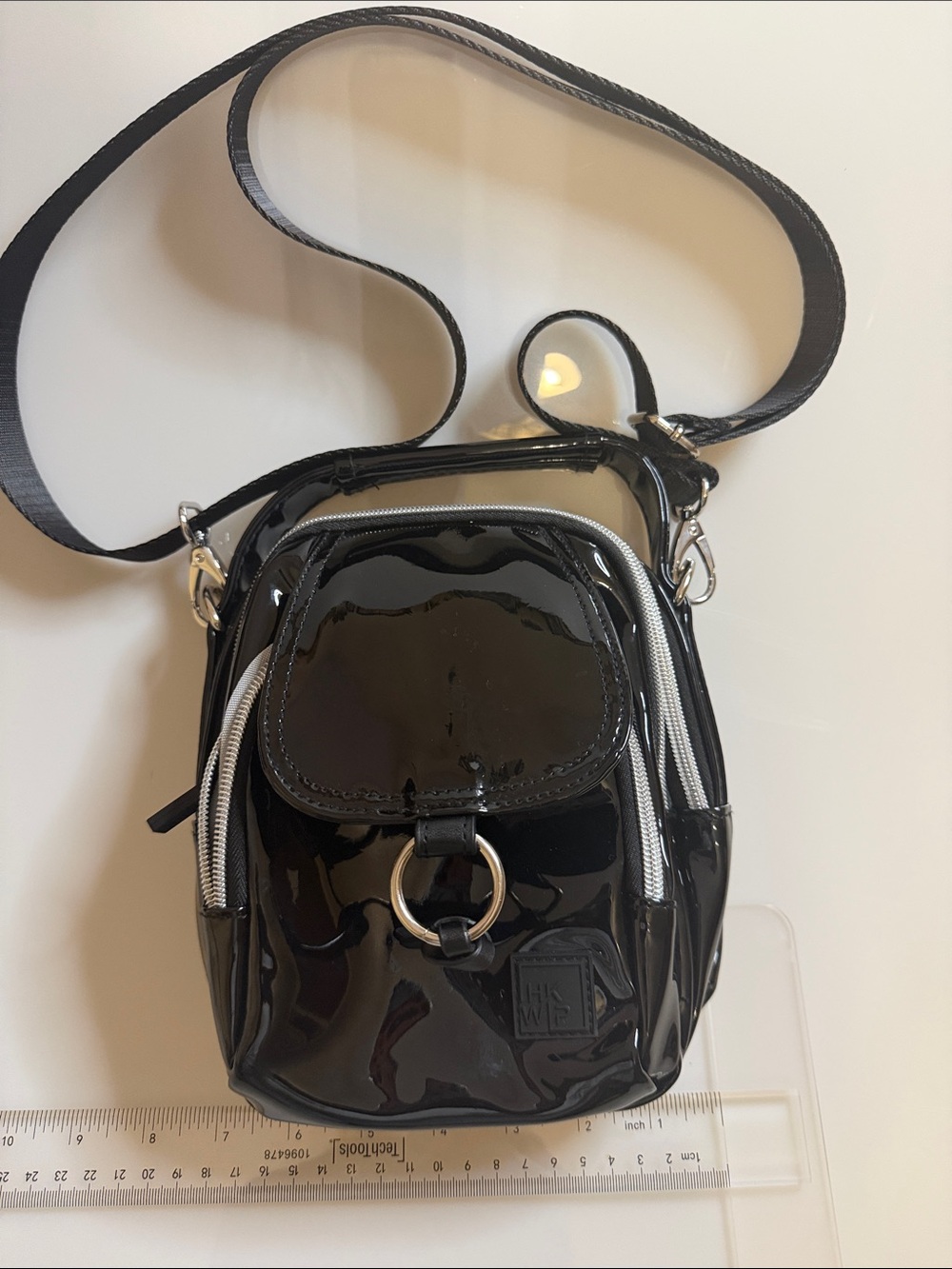 IHKWIP The Stellar North/South Crossbody with Top Handle black patent